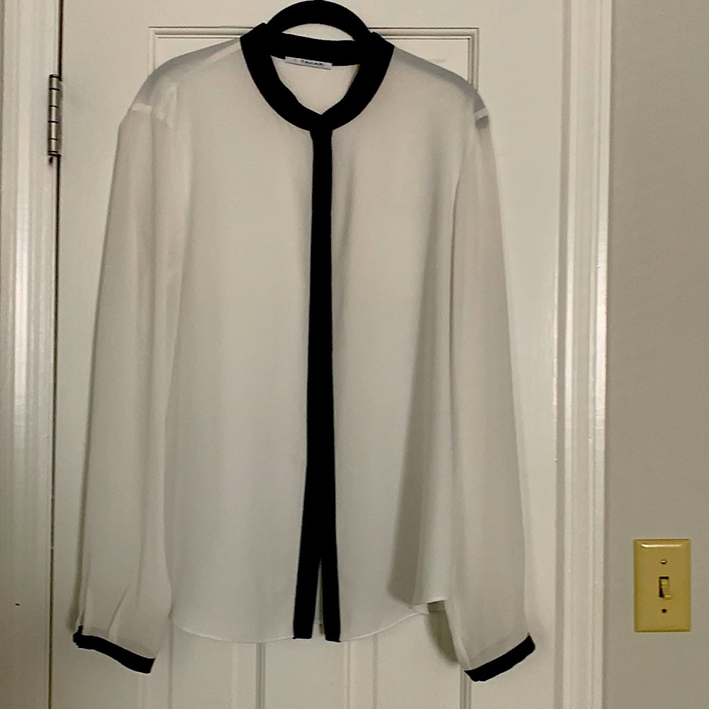 White blouse with black accents